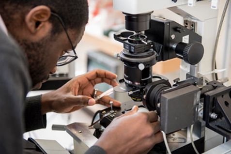 Doctor with microscope