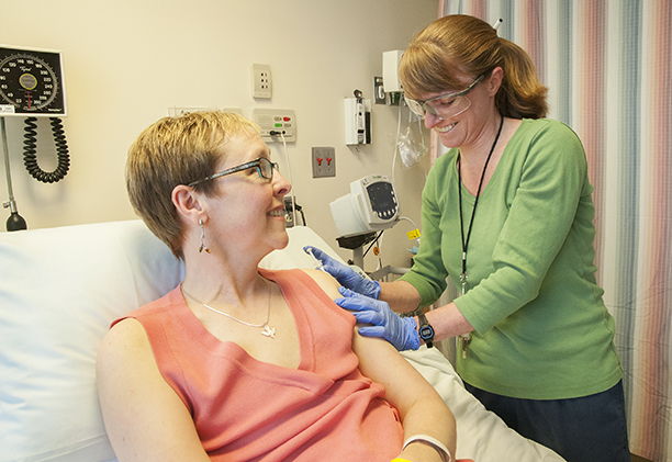A physician cares for a patient